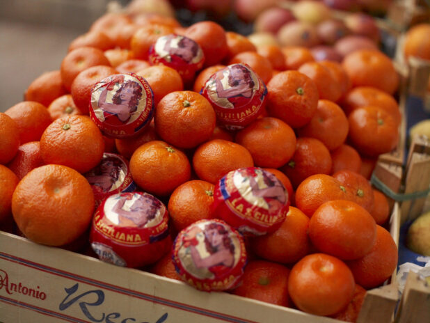 Close Up of a Crate of Fresh Tangerines at an Outdoor Food Market in Venice, Italy