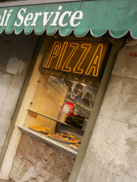 Pizza Slices at a Self-Service Take-Out Window in Venice, Italy