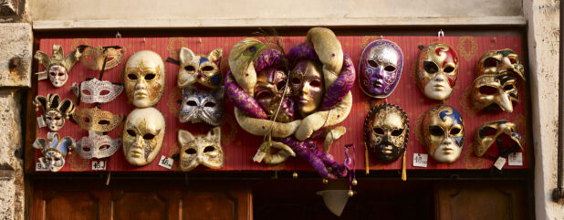 An Array of Venetian Mask Souvenirs at an Outdoor Shop in Venice, Italy