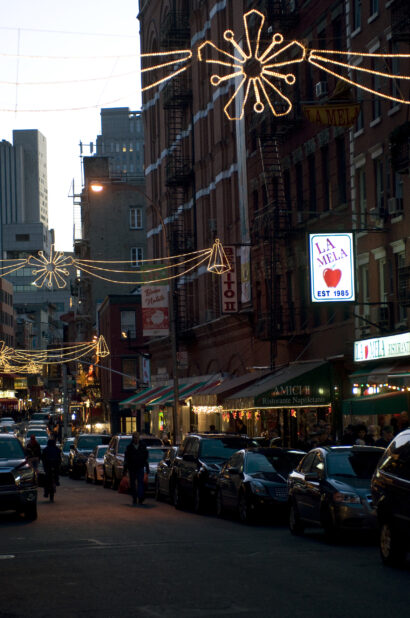 Evening View of a Car-Lined Street in Little Italy, Manhattan, New York City During the Holiday Season