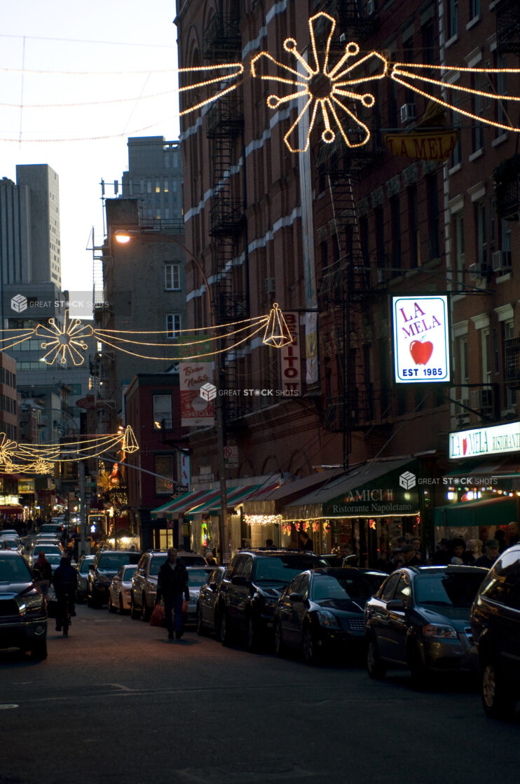 Evening View of a Car-Lined Street in Little Italy, Manhattan, New York City During the Holiday Season