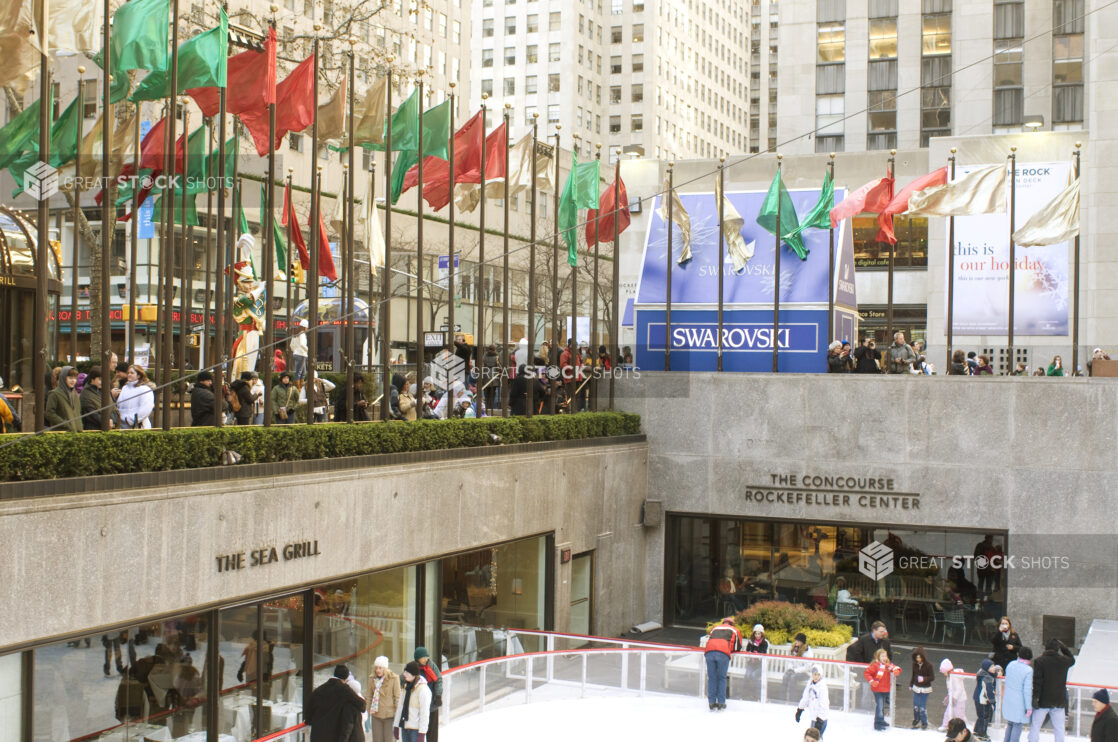 View into the Outdoor Ice Rink in the Lower Plaza of the Rockefeller Center during Christmas in Manhattan, New York City