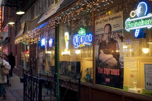 Storefront of the Mulberry Street Bar in Little Italy, Manhattan, New York City at Night