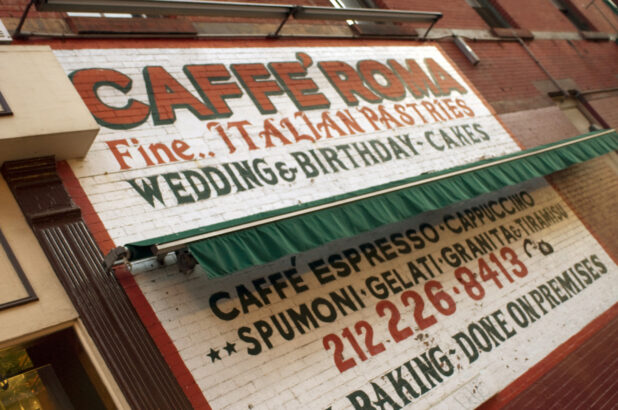 Store Advertisement on the Exterior Brick Wall of Caffe Roma in Little Italy, Manhattan, New York City