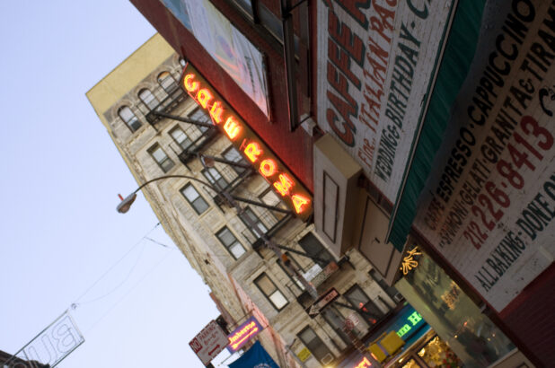 Neon Lights and Store Advertisement on the Exterior of Cafe Roma in Little Italy, Manhattan, New York City