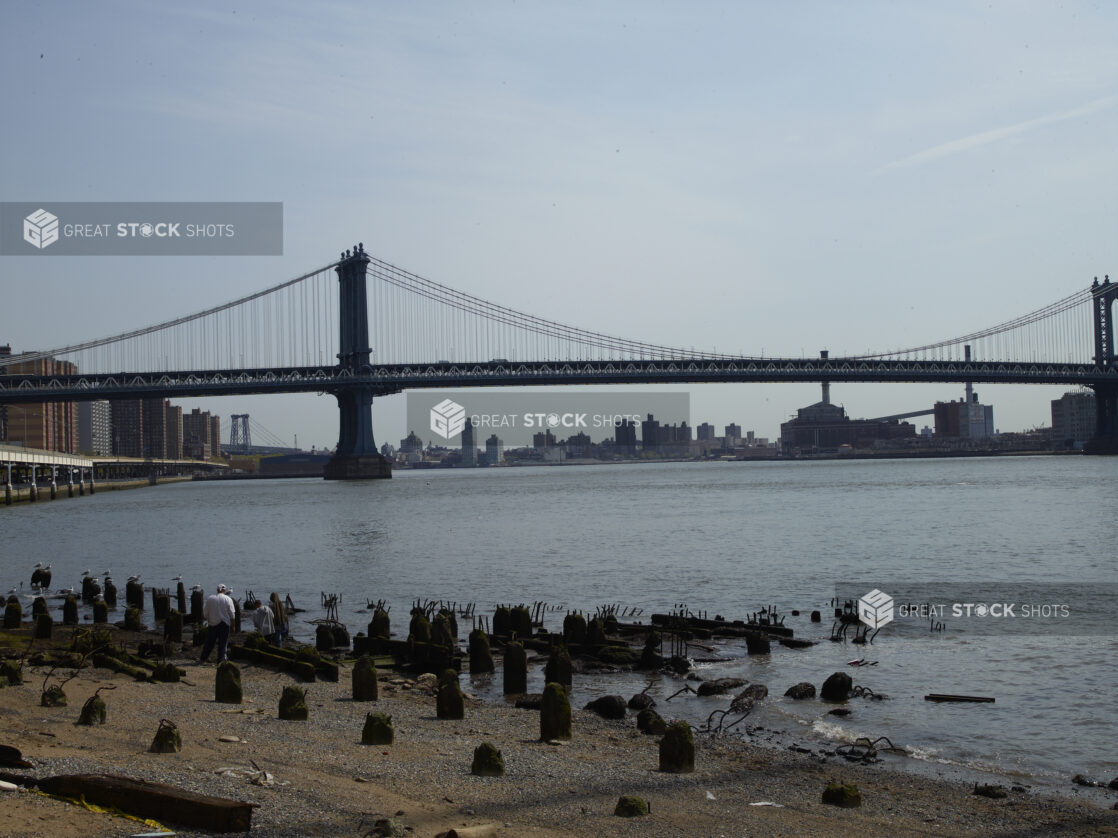 Manhattan Bridge from the Shore of South Street Seaport in Manhattan, New York City