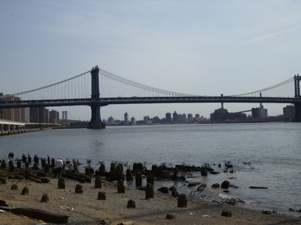Manhattan Bridge from the Shore of South Street Seaport in Manhattan, New York City
