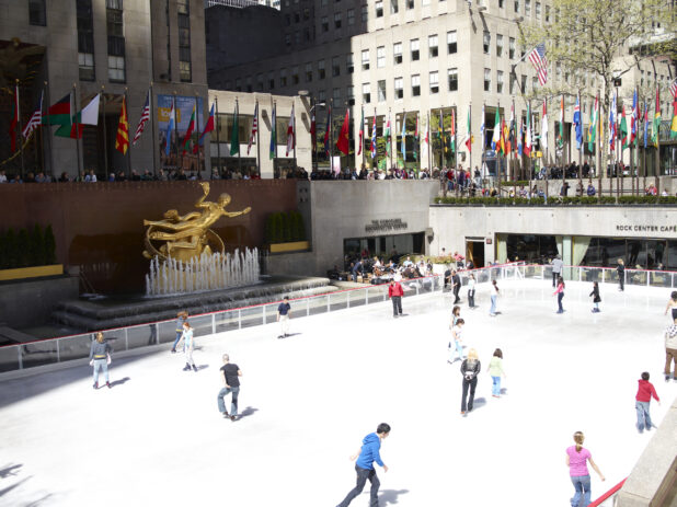 People Skating on the Outdoor Ice Rink in the Lower Plaza of the Rockefeller Center in Manhattan, New York City - Variation