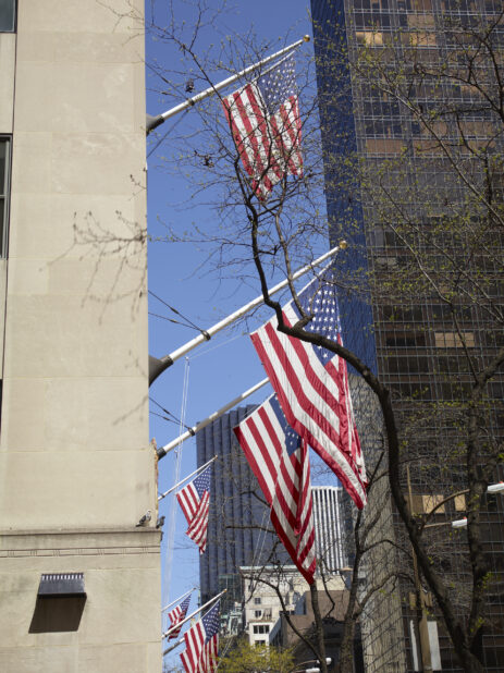 Close-Up of American Flags Hanging on the Side of a Building in Manhattan, New York City