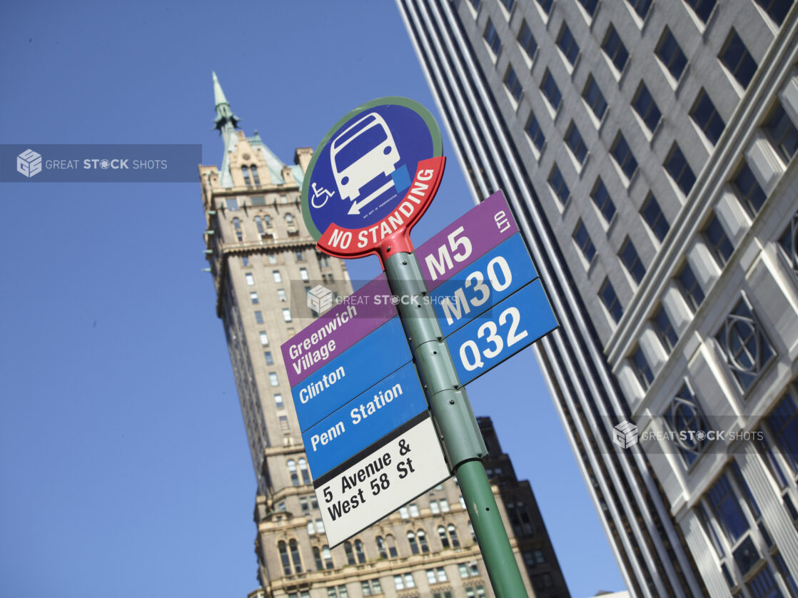 Greenwich Village M5 Bus Stop Sign with the Sherry-Netherland Hotel Tower in the Background in Manhattan, New York City