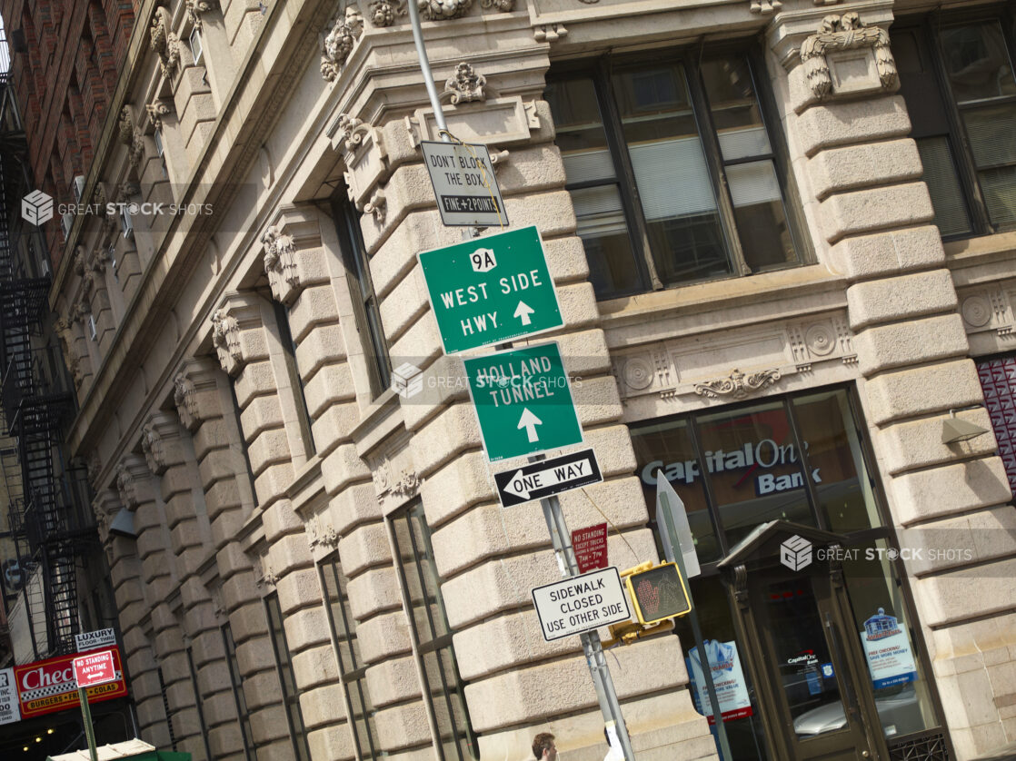 Street Signs and the Corner of the Broadway-Chambers Building in Manhattan, New York City