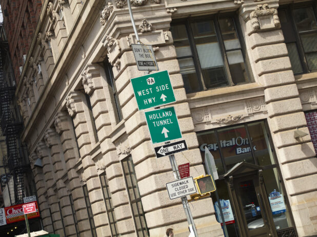Street Signs and the Corner of the Broadway-Chambers Building in Manhattan, New York City