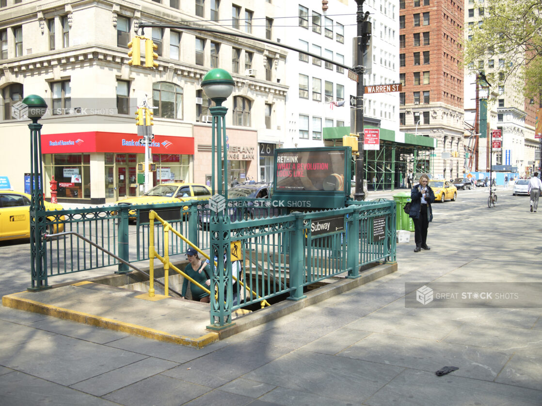 Green Staircase Subway Entrance with Subway Globe Lamp Posts in Manhattan, New York City