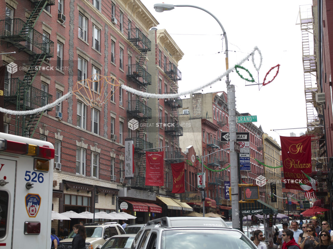 Red Brick Buildings Along a Busy Street in Little Italy, Manhattan, New York City