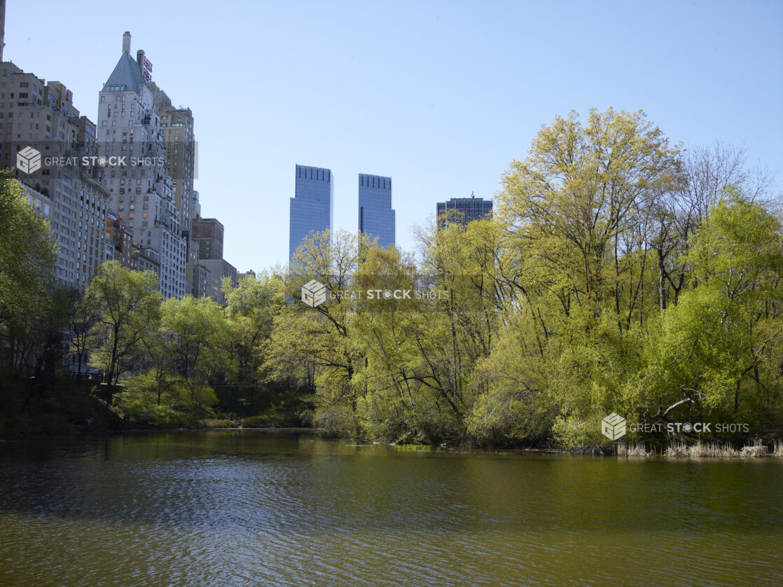 View Across a Pond in Central Park Towards Time Warner Center and Other Buildings in Manhattan, New York City