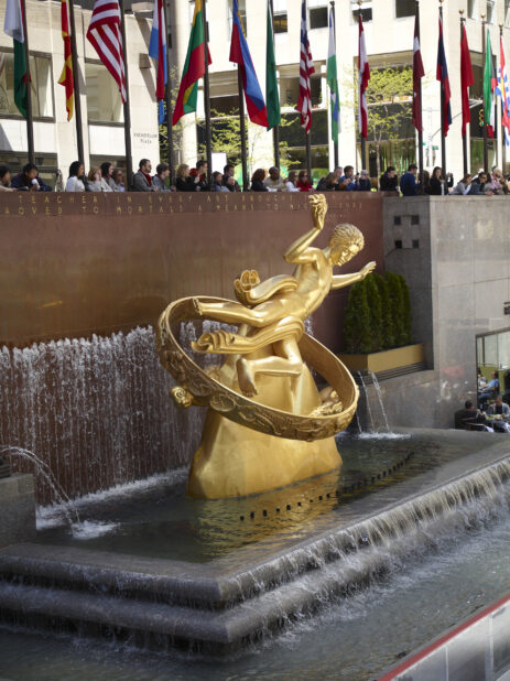 Portrait View of the Water Fountain Featuring the Sculpture of Prometheus in the Lower Plaza of the Rockefeller Center in Manhattan, New York City