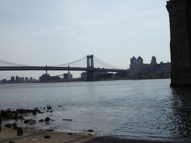 Across-the-Lake View of Manhattan Bridge From the Shore of the East River in Manhattan, New York City