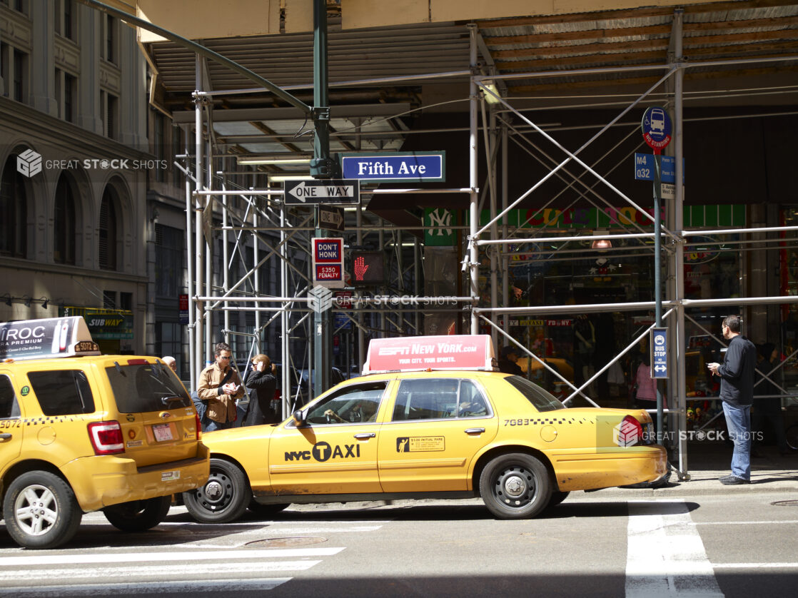 Yellow NYC Taxi Cabs on Fifth Avenue in Manhattan, New York City