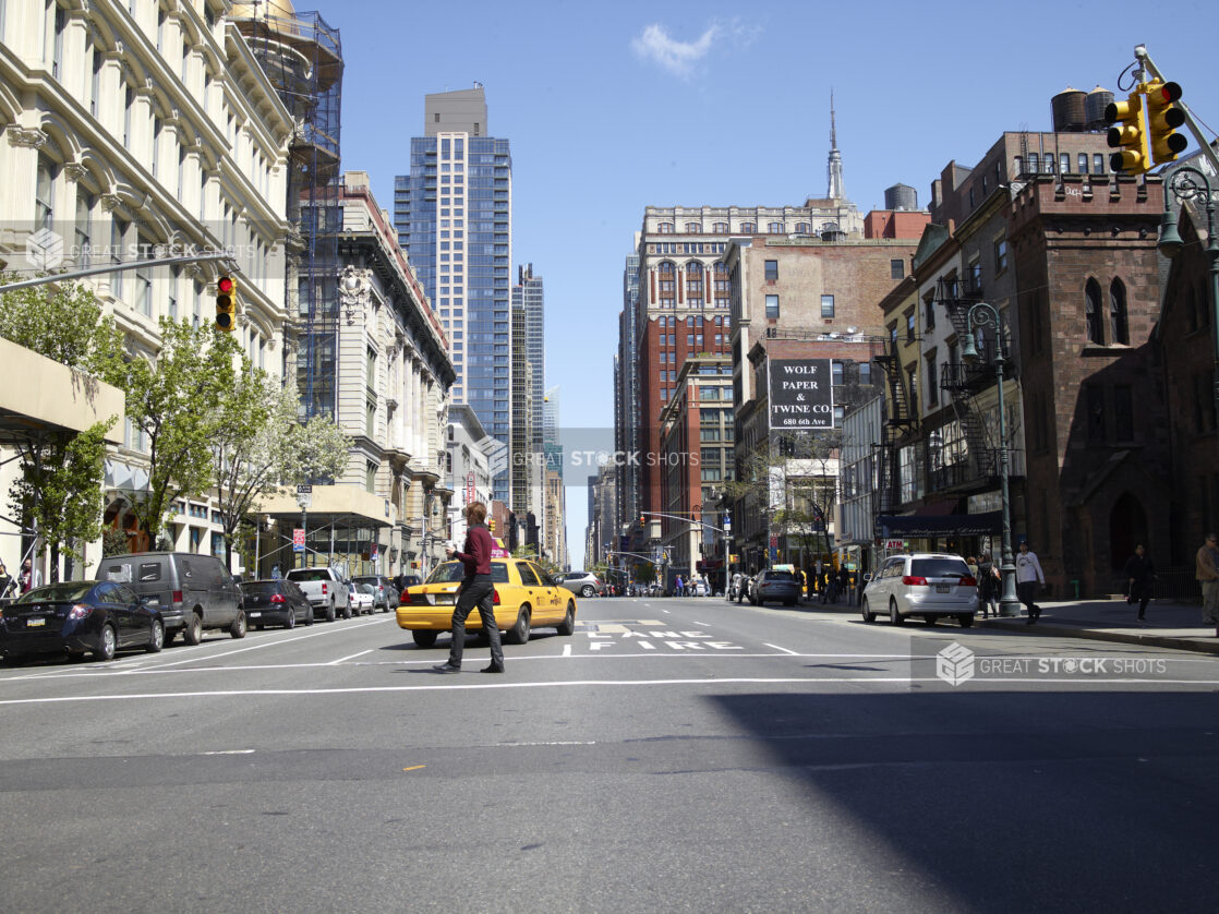 Street Level View Down Sixth Avenue in Manhattan, New York City