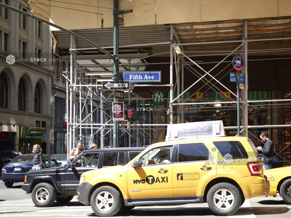 Yellow NYC Taxi Cabs on Fifth Avenue in Manhattan, New York City - Variation