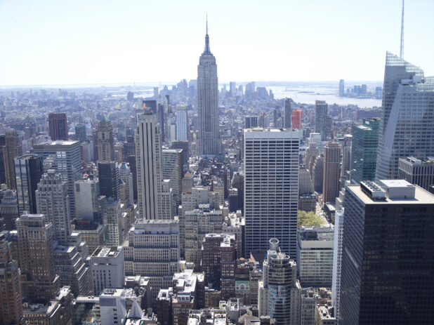 Observation Deck View Down to Empire State Building, Office Towers and City Streets of Manhattan, New York City