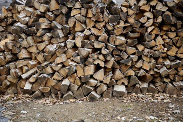 Close Up of Logs for Wood-Burning Stoves Piled High for Winter in Cottage Country, Ontario, Canada