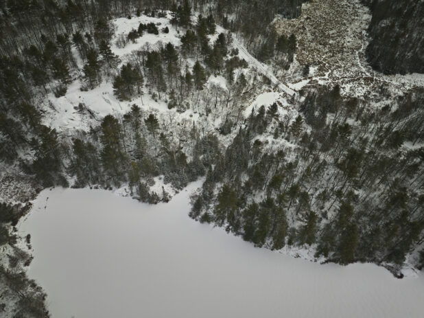 Overhead Drone View of an Evergreen Forest Covered in Snow in Cottage Country in Ontario, Canada - Variation