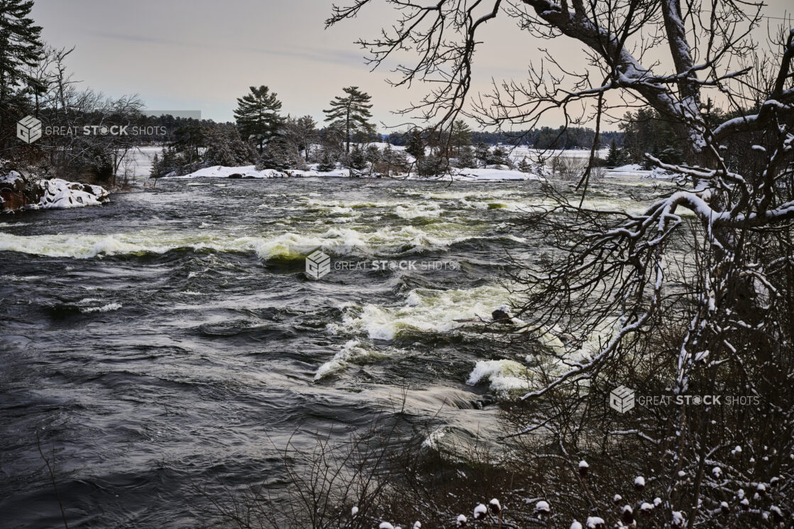 View of a River with Choppy Waters After a Winter Storm in Cottage Country, Ontario, Canada