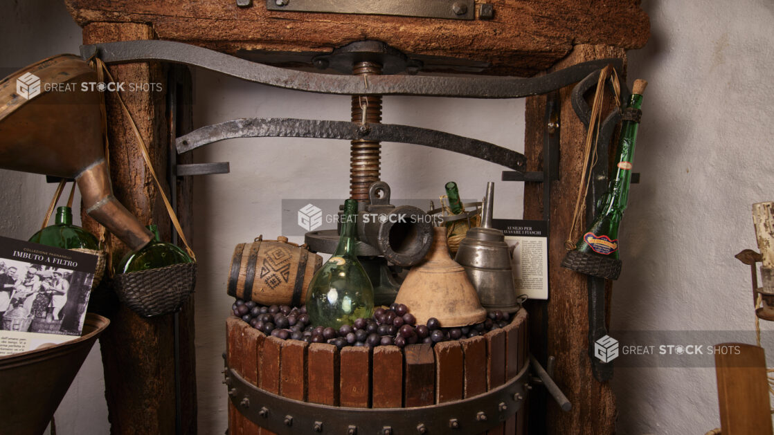 An Antique Oak Wine Press Surrounded by Wine Paraphernalia in a Wine Museum in Castel Gandolfo, Italy