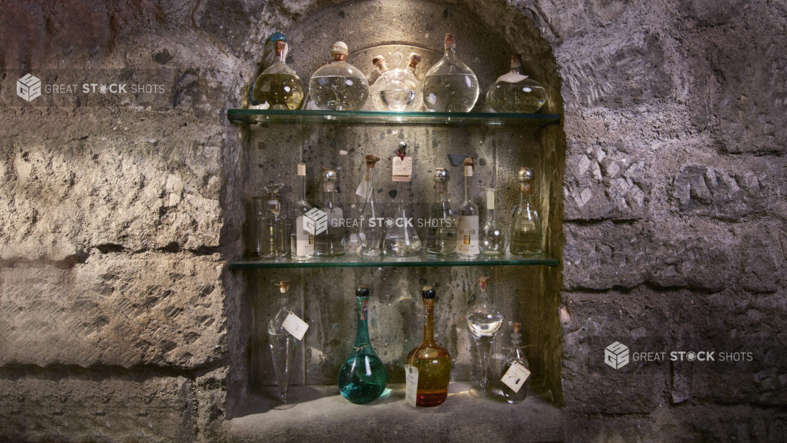 Glass Shelves Lined with Wine Paraphernalia in the Wine Museum of Ristorante Pagnanelli in Castel Gandolfo, Italy
