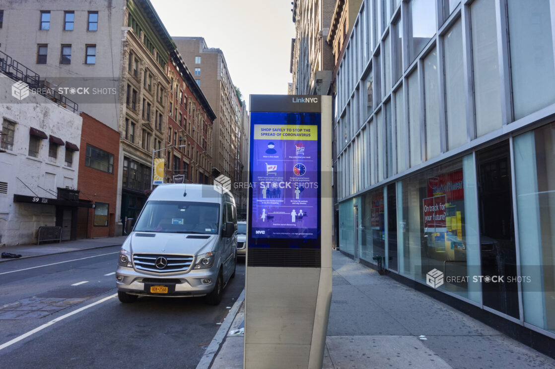 Close Up of a LinkNYC Kiosk Showing Social Distancing Messages in an Empty City Street During Lockdown in Manhattan, New York City