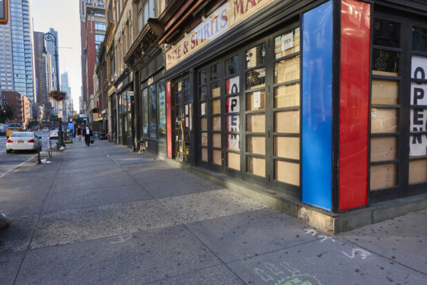 View of a Boarded Up Corner Store During Lockdown in Manhattan, New York City