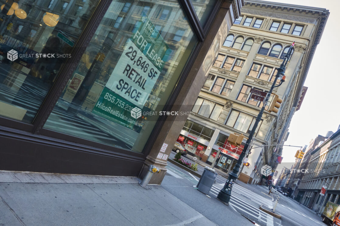 View of a Deserted Street Corner with a Vacant Retail Store in Manhattan, New York City During Lockdown