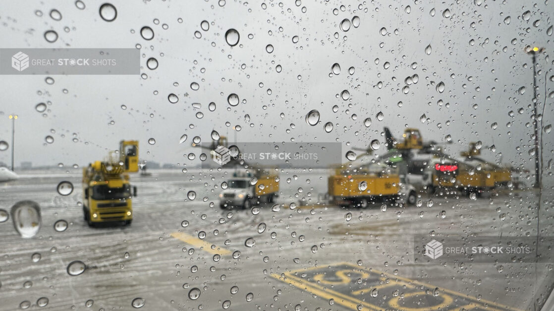 View From a Window Out to an Airport Runway During Bad Winter Weather – Variation 2