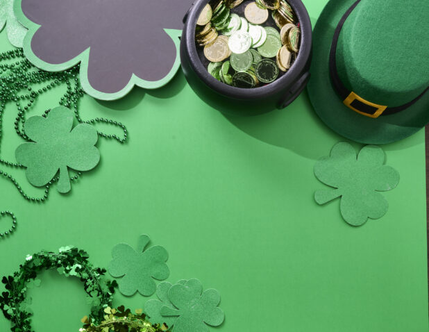 Overhead View of Assorted St. Patrick’s Day Decorations on a Green Background – Variation 4