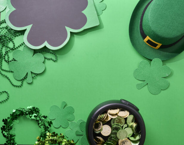 Overhead View of Assorted St. Patrick’s Day Decorations on a Green Background – Variation 5