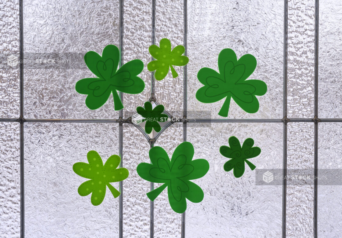 Shamrock Fabric Stickers for St. Patrick's Day Decorations on a Textured Glass Window Surface