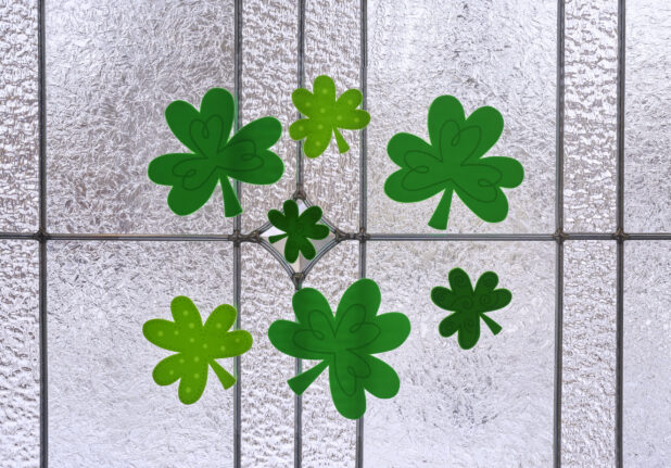 Shamrock Fabric Stickers for St. Patrick's Day Decorations on a Textured Glass Window Surface