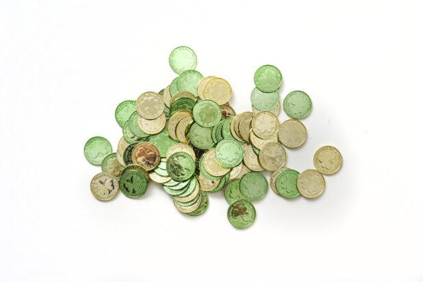 A Pile of Green and Gold Leprechaun Coins for St. Patrick's Day Decorations, Shot on White for Isolation