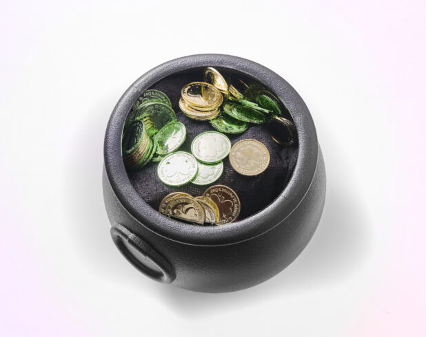 A Black Pot of Gold with Green and Gold Leprechaun Coins for St. Patrick's Day Decorations, Shot on White for Isolation