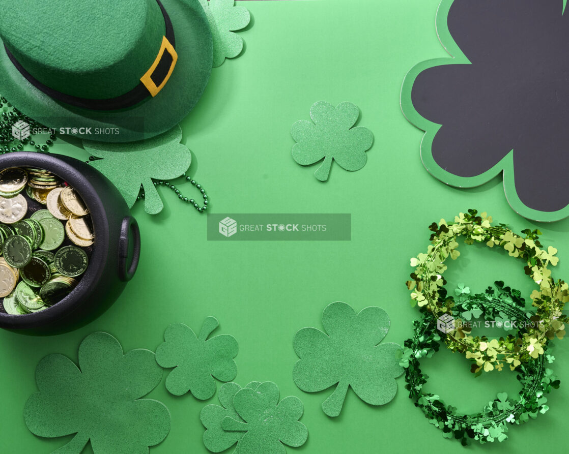 Overhead View of Assorted St. Patrick’s Day Decorations on a Green Background – Variation 3