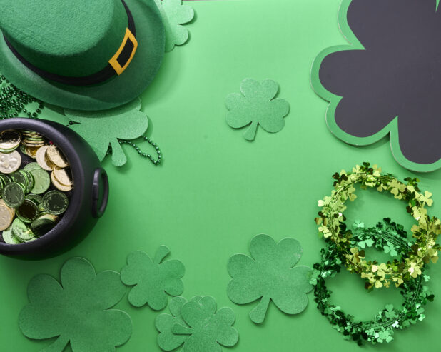 Overhead View of Assorted St. Patrick’s Day Decorations on a Green Background – Variation 3